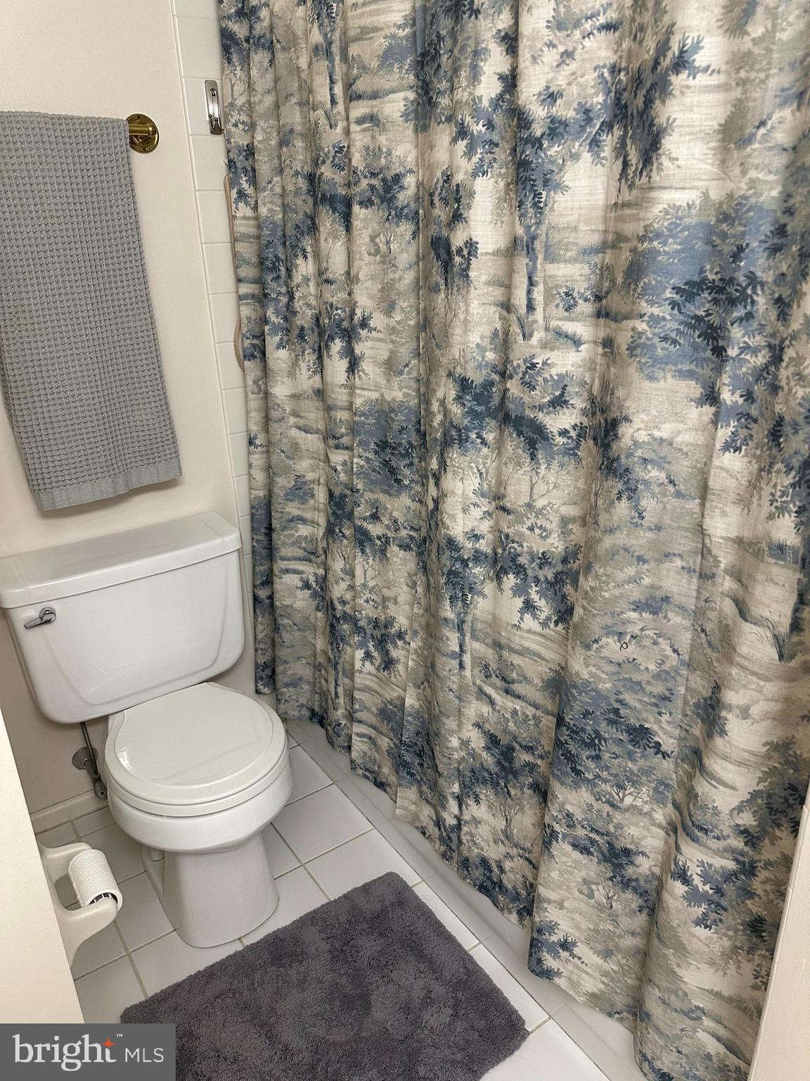 194 Victoria Court Doylestown, PA 18901 - Photo 18 of 20 a white toilet sitting next to a shower