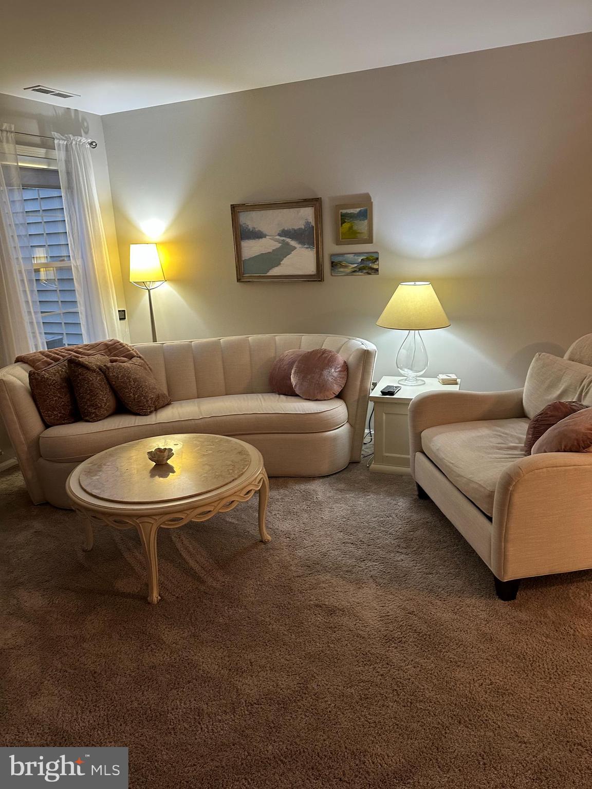 194 Victoria Court Doylestown, PA 18901 - Photo 6 of 20 a living room with furniture and a lamp