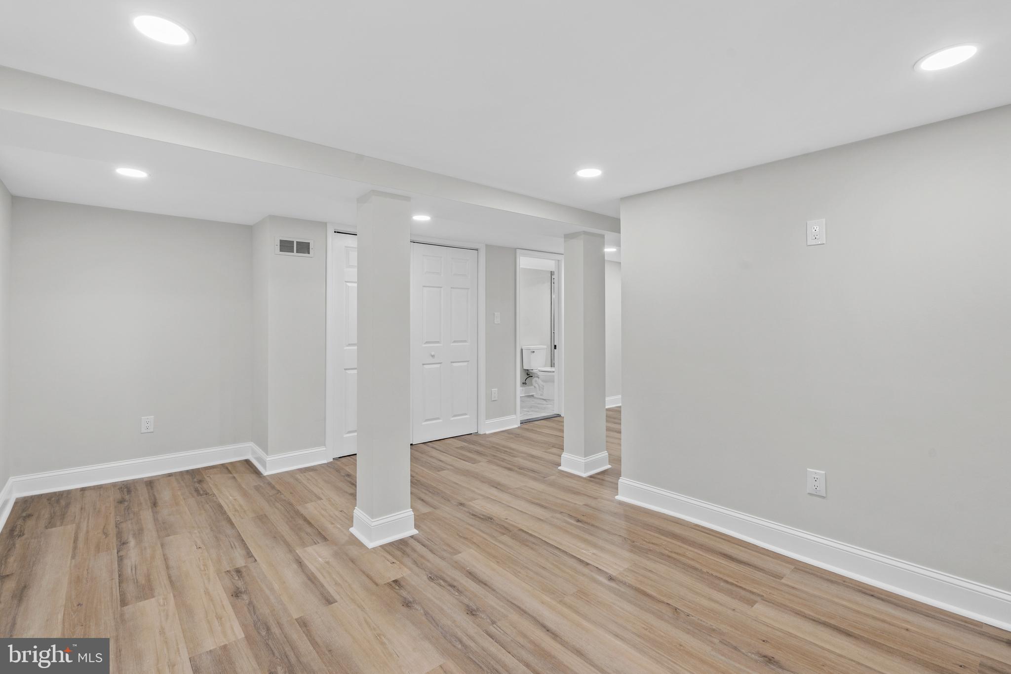 1082 Edge Hill Road Abington, PA 19001 - Photo 32 of 37 a view of an empty room with wooden floor