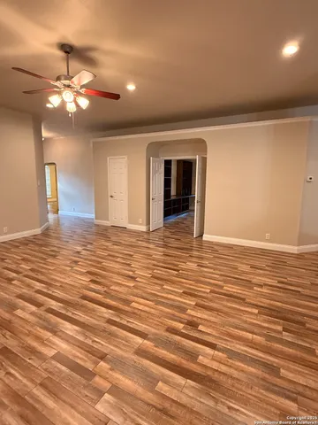 a view of a livingroom with a kitchen