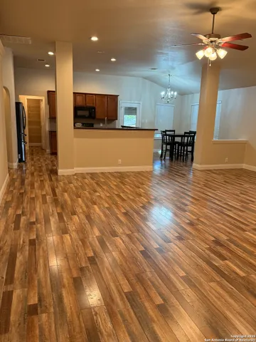 a view of a kitchen with dining room