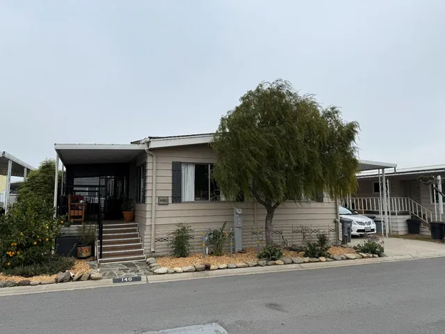 a house view with a outdoor space