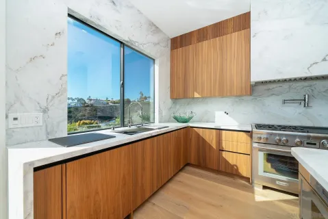 a view of a room with a large window