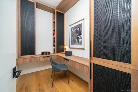 a bedroom with a bed and a couch