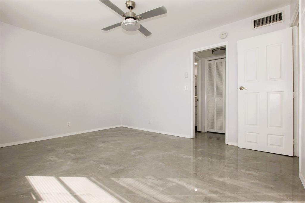 3100 North Course Lane, Unit 103 Pompano Beach, FL 33069 - Photo 23 of 51 a view of an empty room