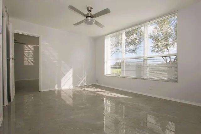 a bathroom with a shower and a toilet