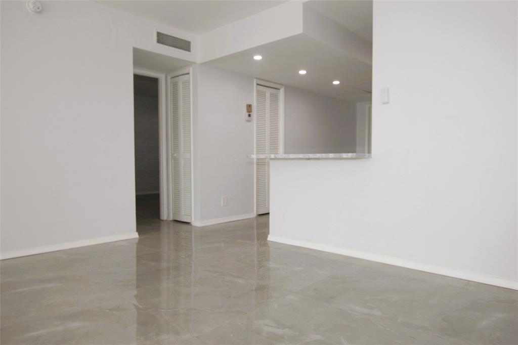 3100 North Course Lane, Unit 103 Pompano Beach, FL 33069 - Photo 31 of 51 a view of an empty room