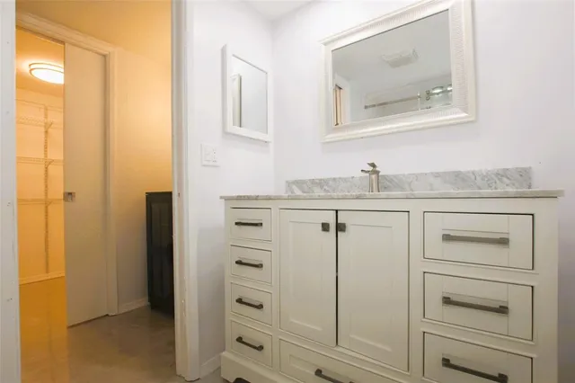 a view of a building next to a yard