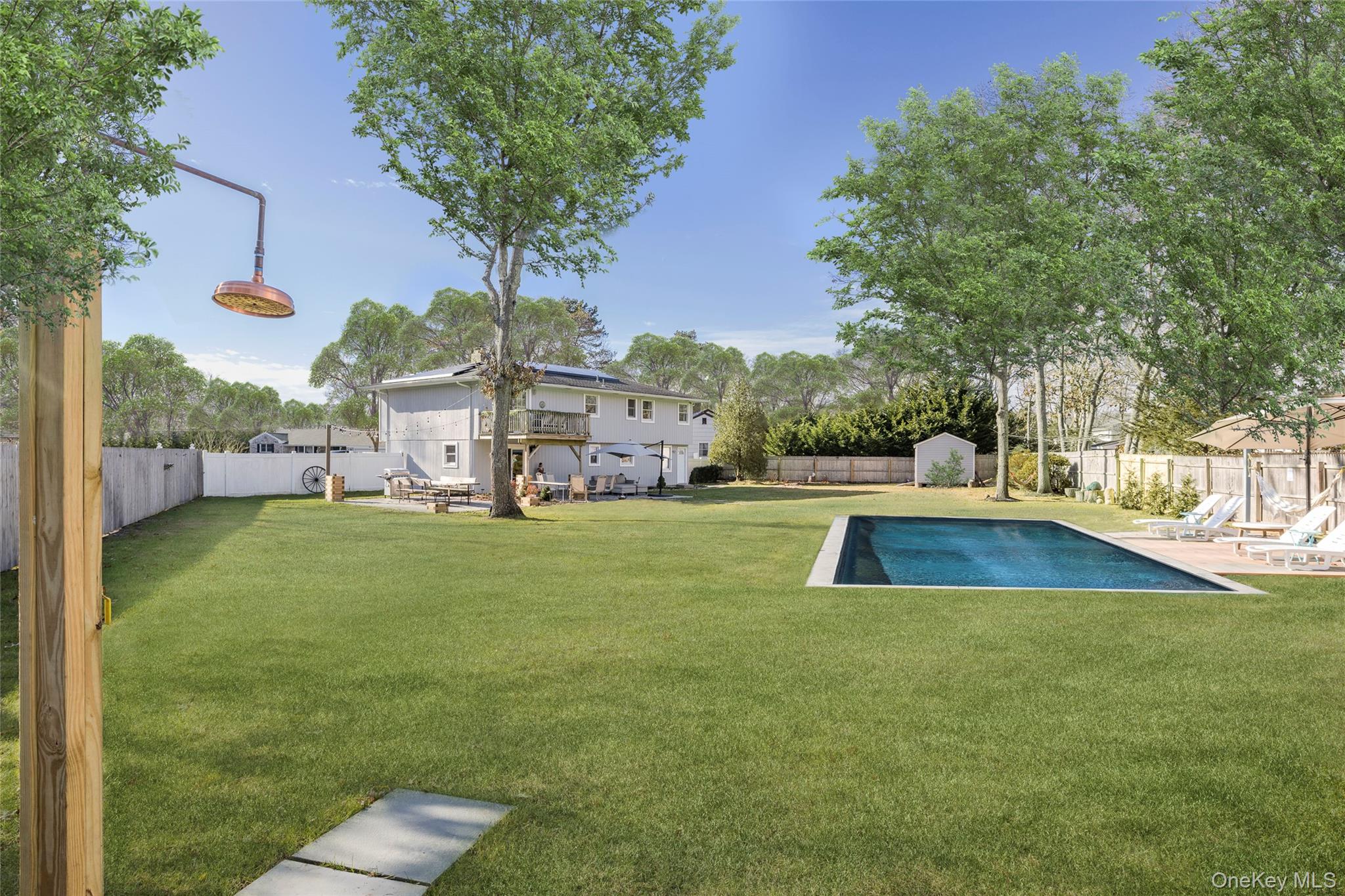 8 Westerly Court Hampton Bays, NY 11946 - Photo 1 of 26 a view of outdoor space yard and lake view
