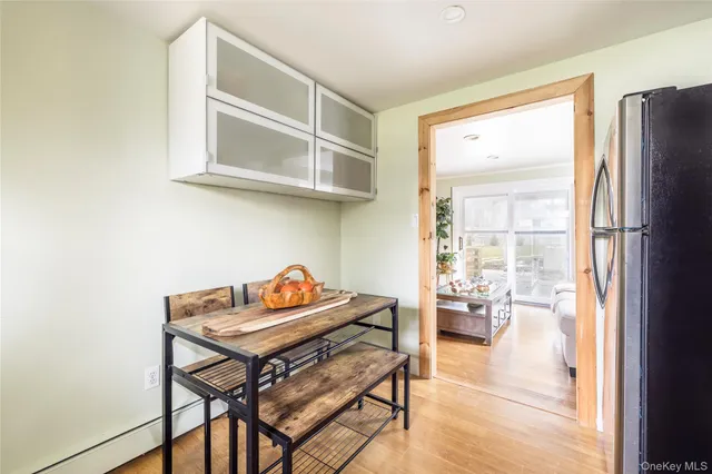a reading room with furniture and a window
