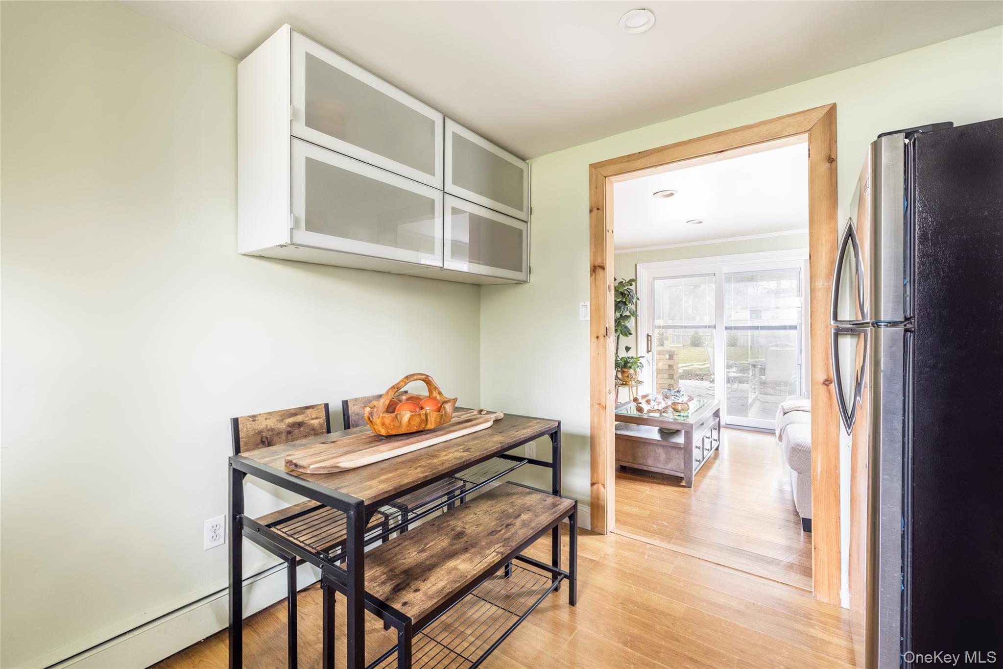 8 Westerly Court Hampton Bays, NY 11946 - Photo 19 of 26 a reading room with furniture and a window