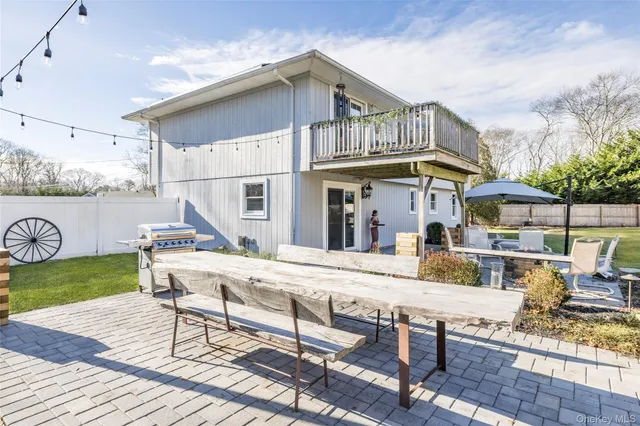 a view of a house with pool porch and wooden floor