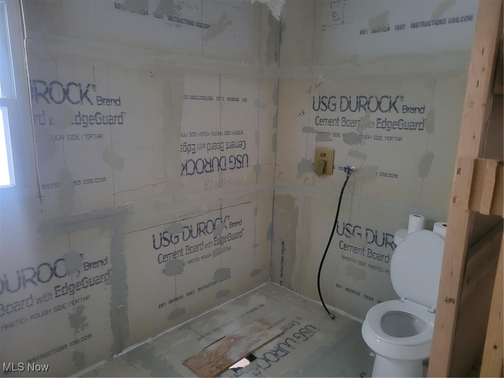 7631 Mines Road Southeast Warren, OH 44484 - Photo 7 of 22 Bathroom featuring toilet