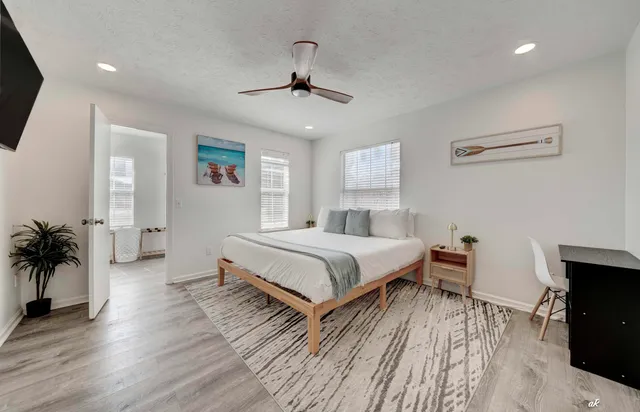 a bathroom with a double vanity sink mirror double and shower