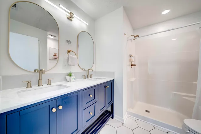 a bedroom with bunk bed and a window