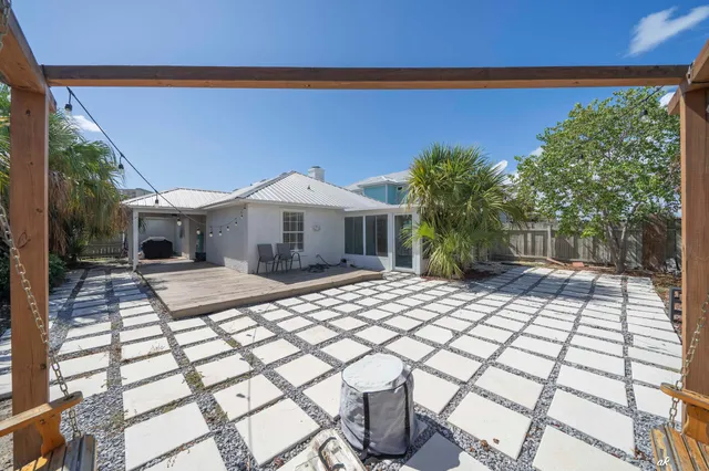 a living room filled with furniture and a rug