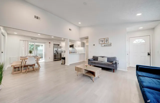 a living room with furniture and a couch