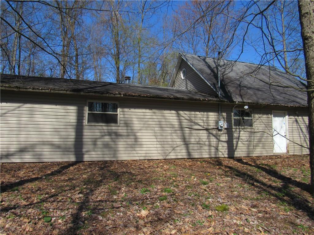 278 Chipmunk Road Evans City, PA 16033 - Photo 3 of 15 a view of a backyard of the house