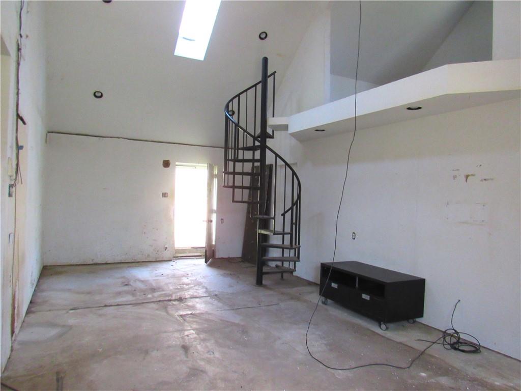 278 Chipmunk Road Evans City, PA 16033 - Photo 5 of 15 a view of an empty room with stairs