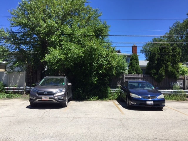10071 Frontage Road, Unit G Skokie, IL 60077 - Photo 22 of 22 a car parked in front of a house