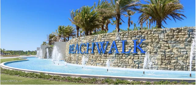 a view of a patio with a white house