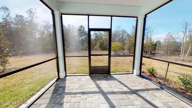 a view of a large window with an outdoor space