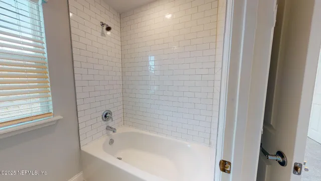a bathroom with a bathtub