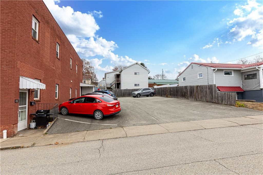 802 Horner Street Brackenridge, PA 15014 - Photo 3 of 9 a cars parked in front of a building