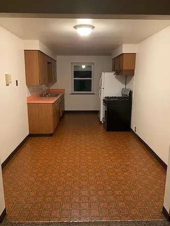 a room with furniture and flat screen tv