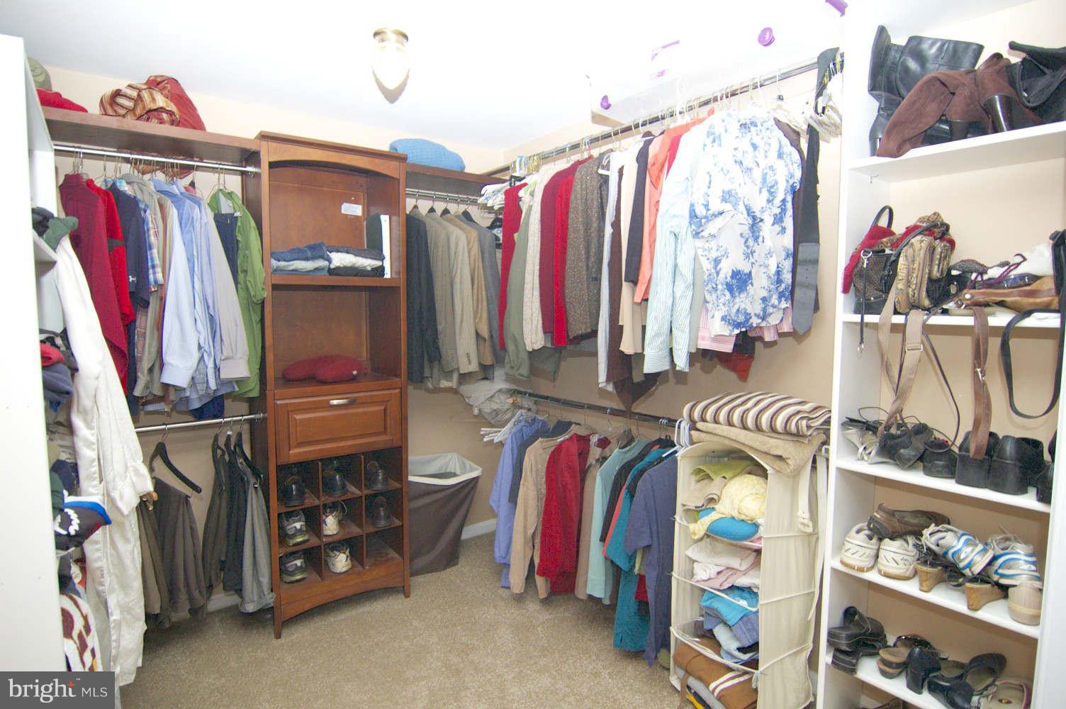934 Pointer Ridge Drive Gaithersburg, MD 20878 - Photo 16 of 30 Enlarged Mstr walkin closet opens to bath