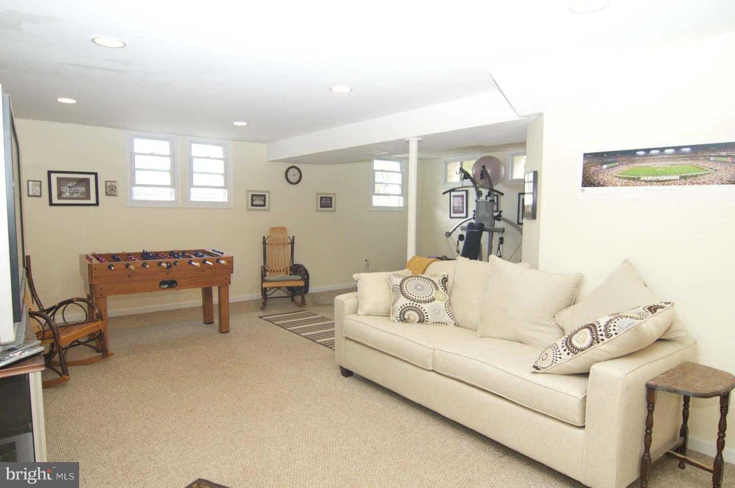 934 Pointer Ridge Drive Gaithersburg, MD 20878 - Photo 23 of 30 Extra lge windows added in this spacious Rec/R
