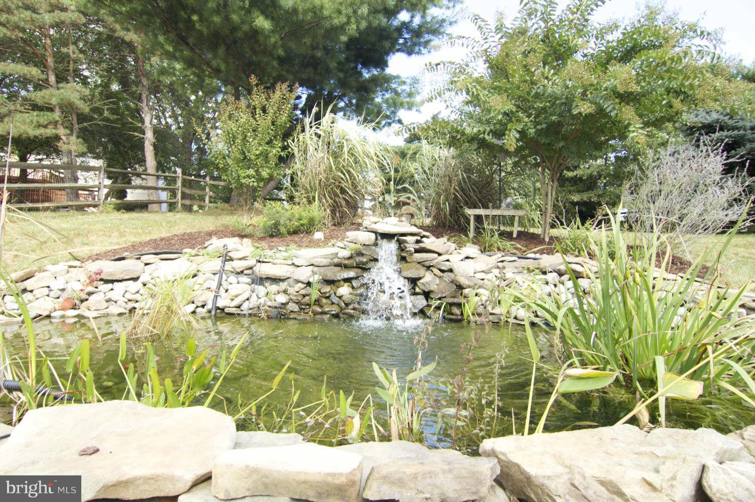 934 Pointer Ridge Drive Gaithersburg, MD 20878 - Photo 27 of 30 Stocked fish pond with water fall