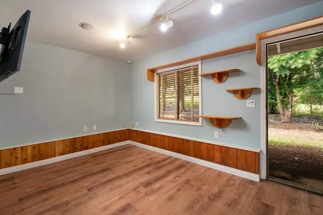 a living room with large window