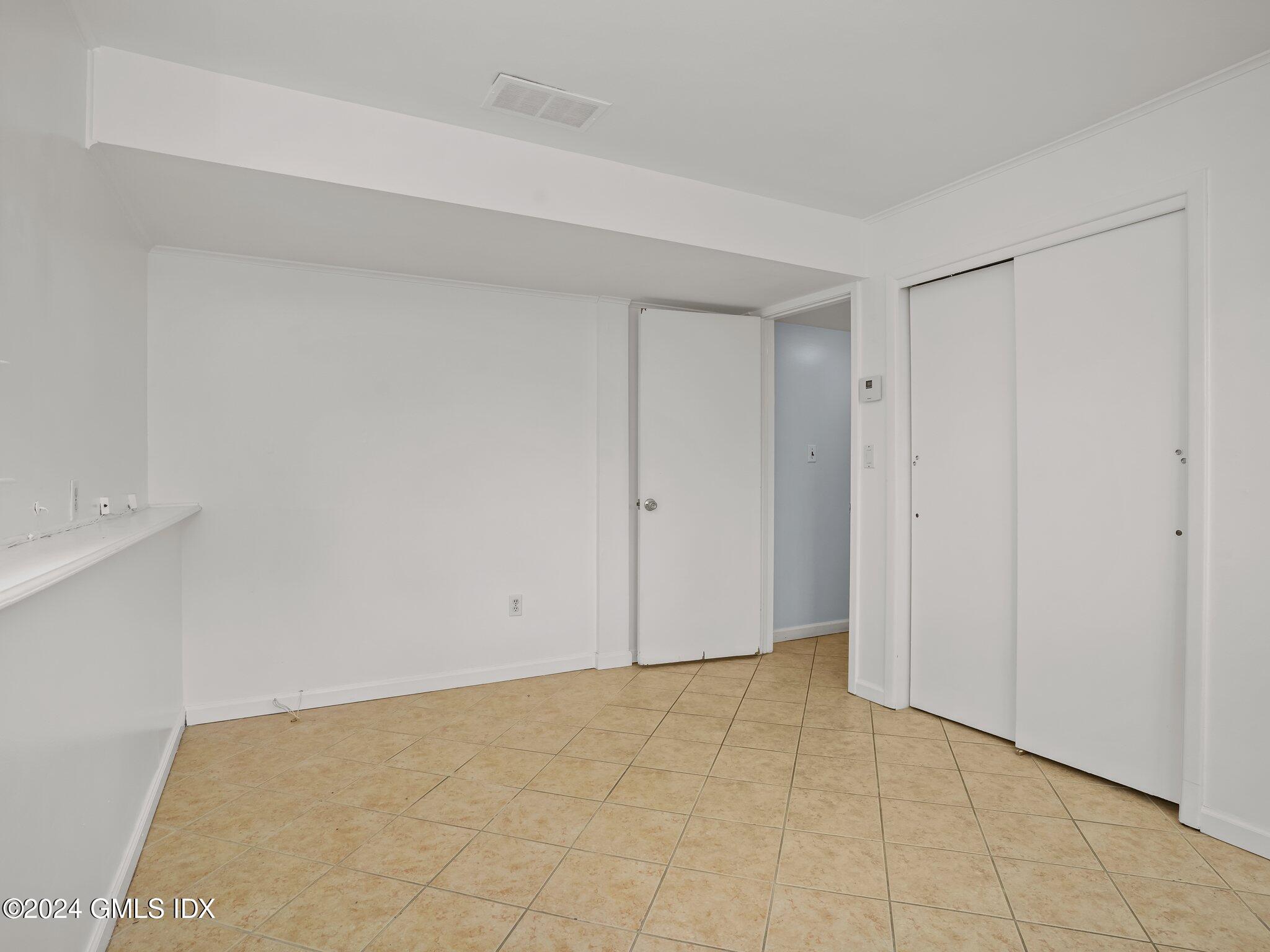 59 Lancer Road Riverside, CT 06878 - Photo 10 of 13 a view of an empty room