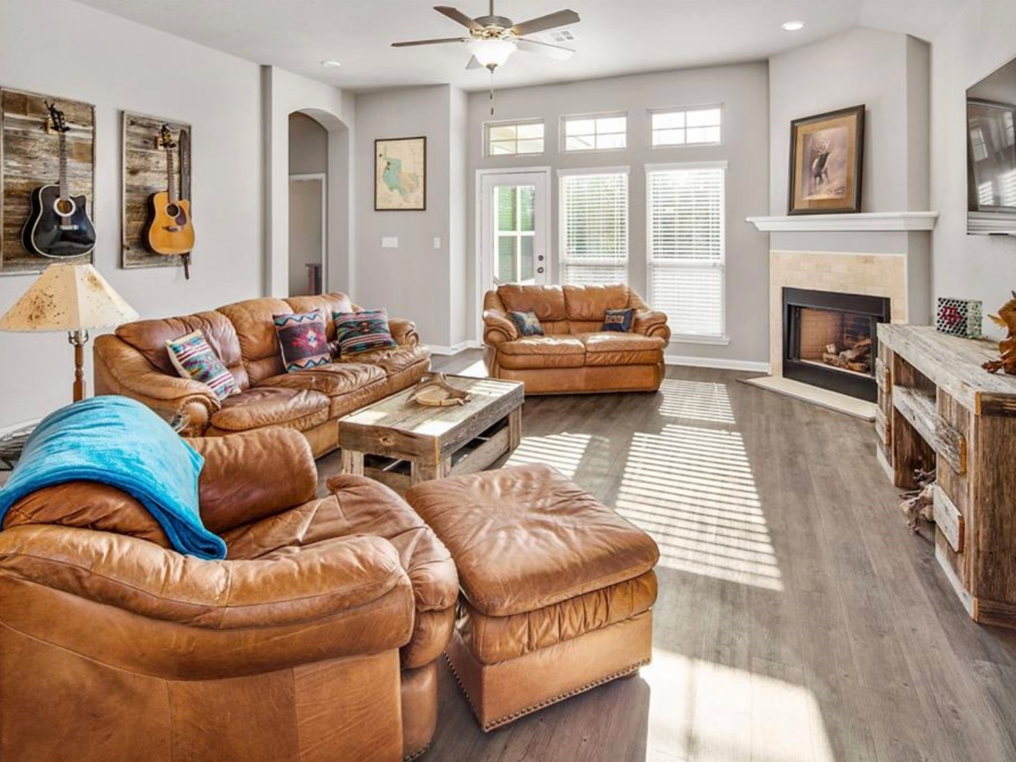 2025 Jester Trail Bryan, TX 77807 - Photo 13 of 24 a living room with furniture fireplace and a fireplace