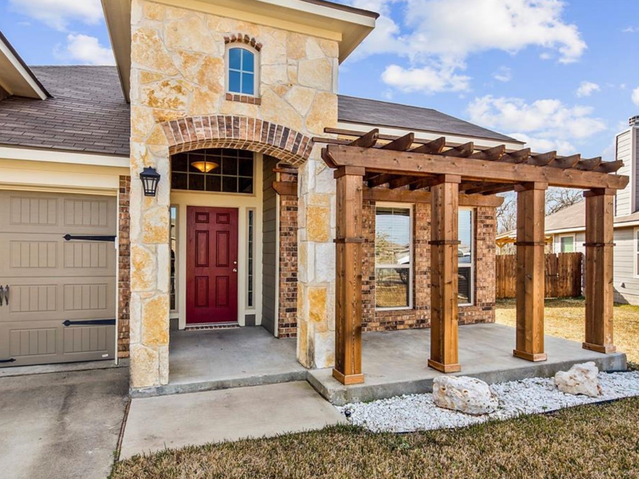 2025 Jester Trail Bryan, TX 77807 - Photo 3 of 24 a view of a building with entrance