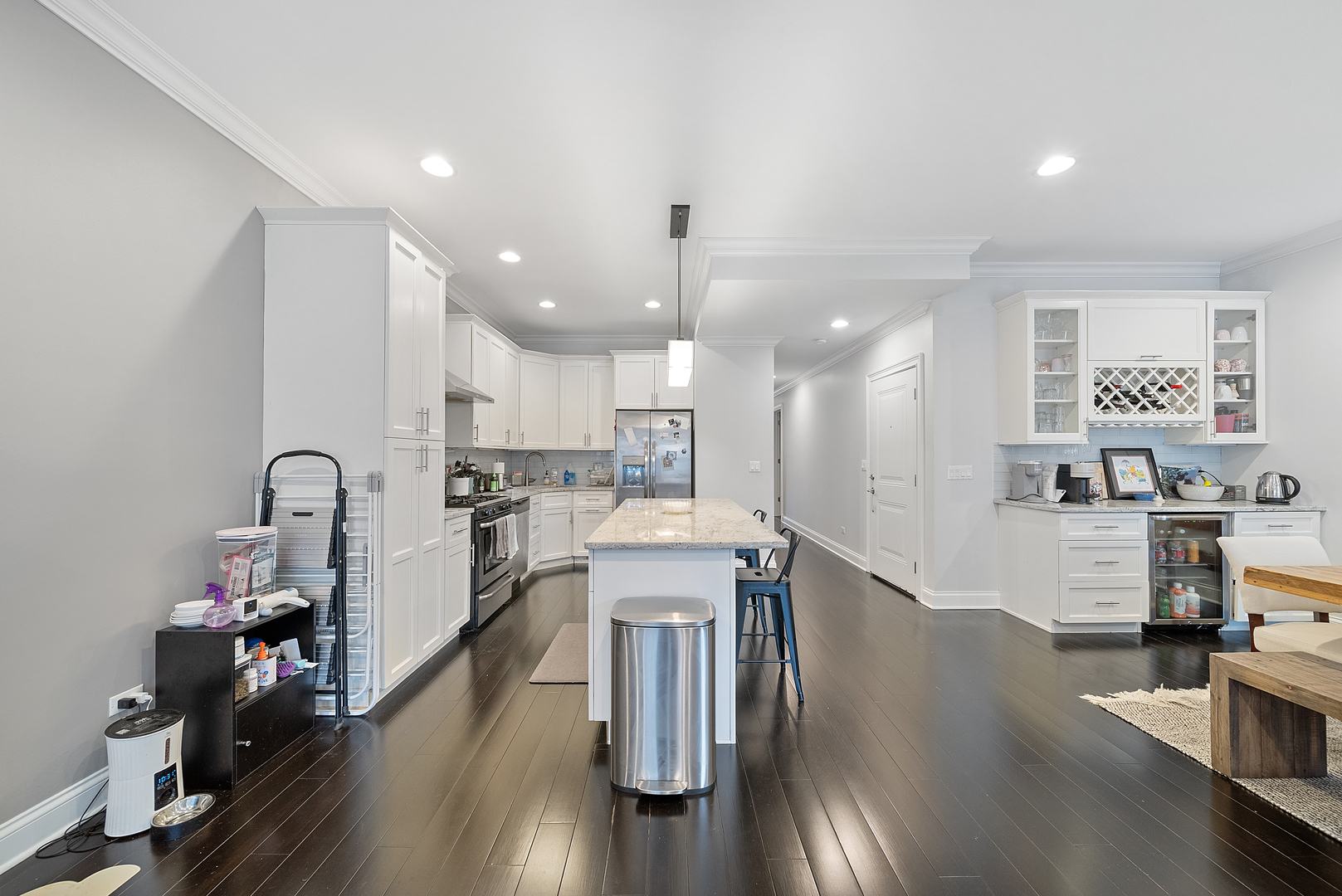 1041 West Madison Street, Unit 3 Chicago, IL 60607 - Photo 11 of 25 a view of a kitchen with cabinets and wooden floor