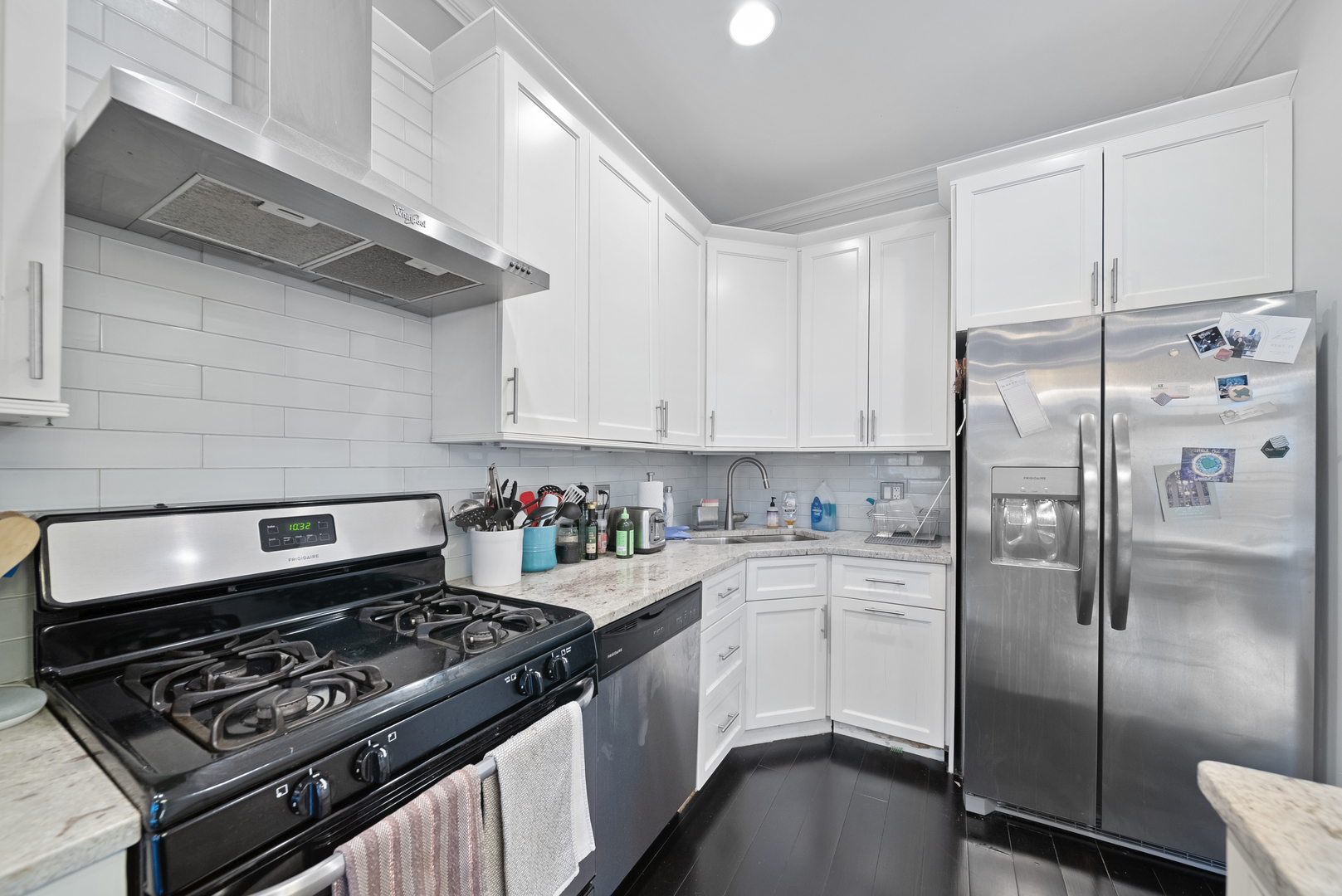 1041 West Madison Street, Unit 3 Chicago, IL 60607 - Photo 5 of 25 a kitchen with a stove and a refrigerator