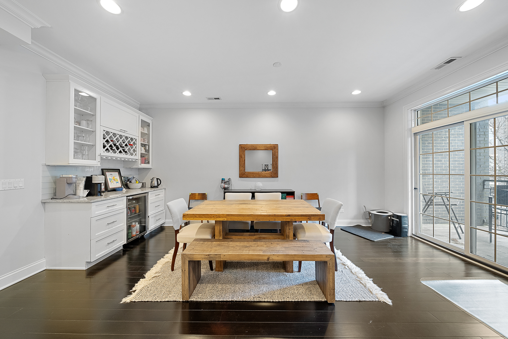 1041 West Madison Street, Unit 3 Chicago, IL 60607 - Photo 7 of 25 a living room with furniture a wooden floor and white walls