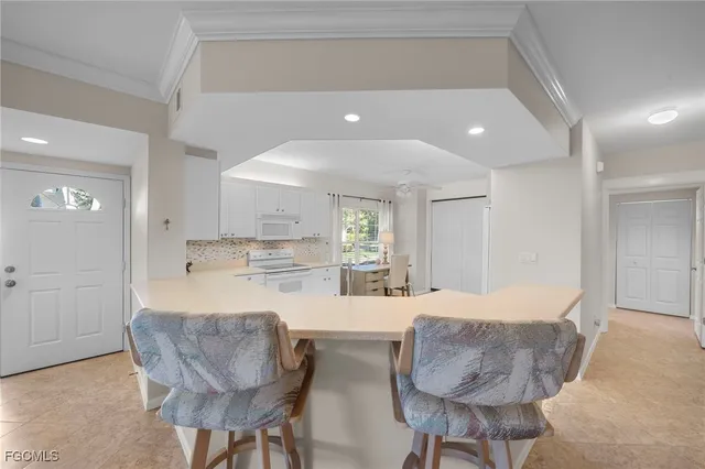 a kitchen with sink and window