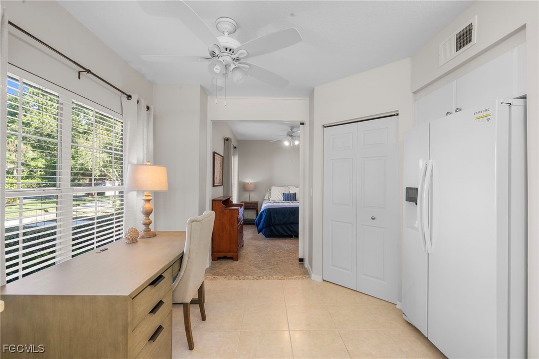 10831 Halfmoon Shoal Road, Unit 104 Estero, FL 34135 - Photo 20 of 49 a view of a livingroom with furniture and a window
