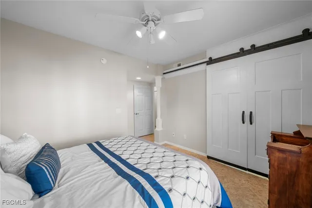 a view of a living room and a floor to ceiling window