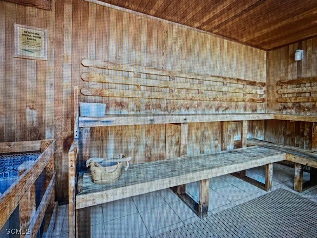 10831 Halfmoon Shoal Road, Unit 104 Estero, FL 34135 - Photo 47 of 49 a kitchen with a sink and cabinets