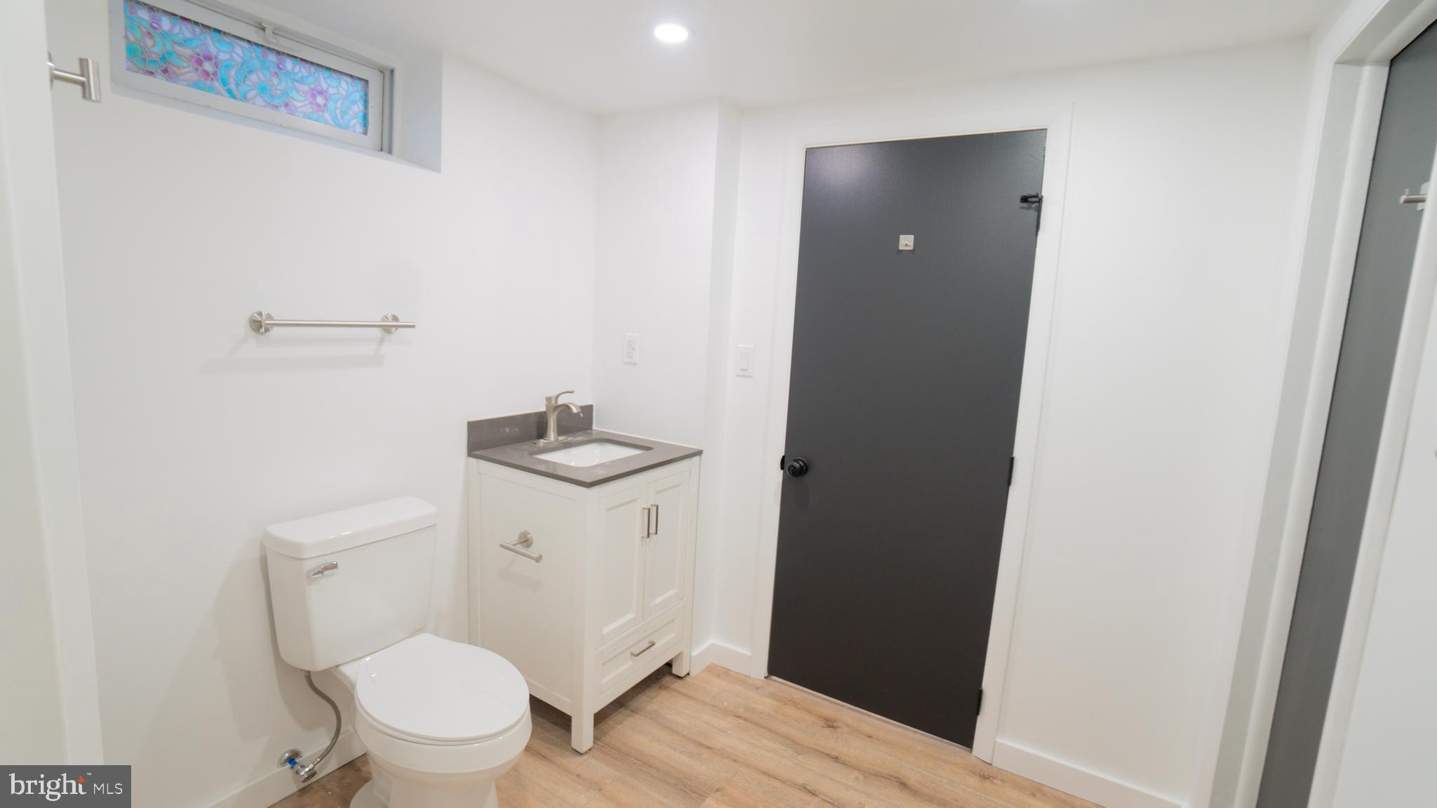 3420 Belair Road Harrisburg, PA 17109 - Photo 27 of 34 a white toilet sitting next to a bathroom sink