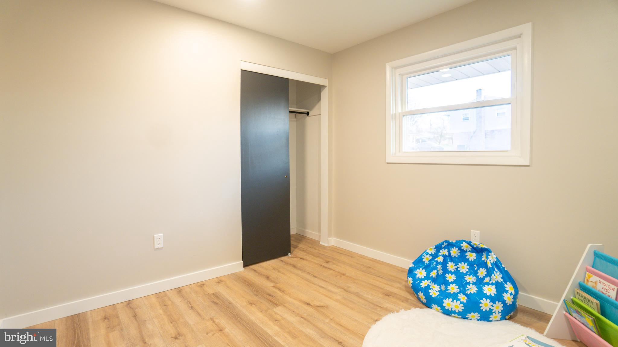 3420 Belair Road Harrisburg, PA 17109 - Photo 10 of 34 a bedroom with a bed and a chair