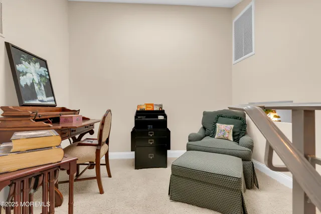 a bedroom with a bed and furniture