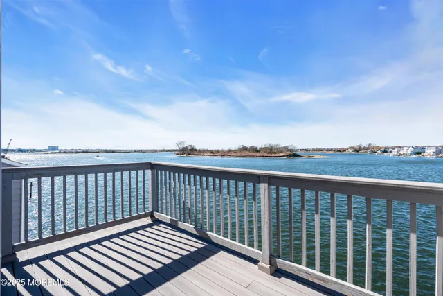 a view of wooden balcony with wooden floor