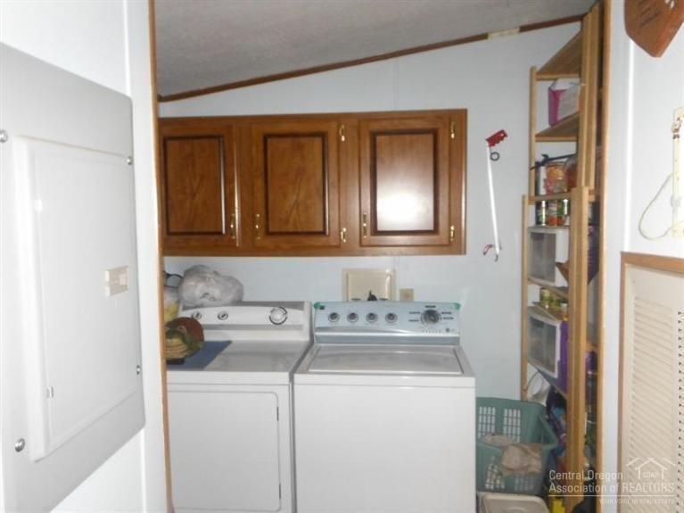 249 Kaehn Road Crescent, OR 97733 - Photo 5 of 25 Laundry room has plenty of storage.