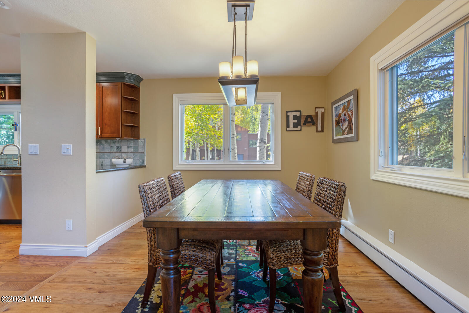 18 Beaver Road, Unit 1 Avon, CO 81620 - Photo 16 of 46 a view of a dining room with furniture window and outside view