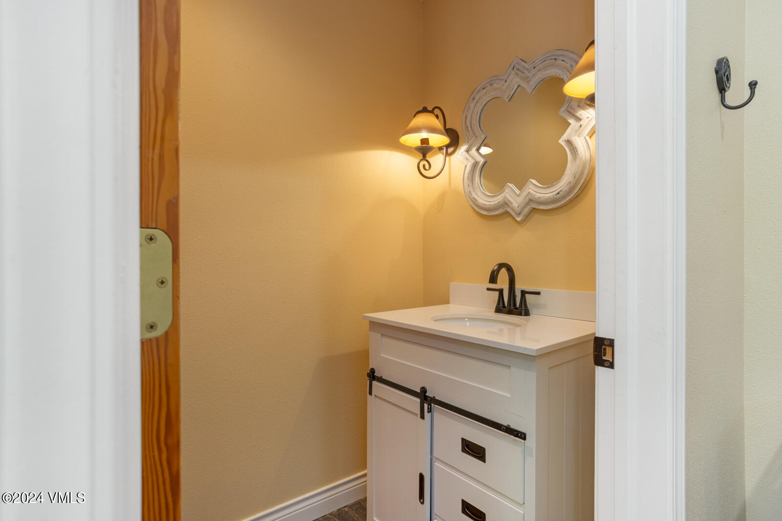 18 Beaver Road, Unit 1 Avon, CO 81620 - Photo 20 of 46 a bathroom with a sink and a mirror